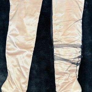 Elegant Light Pink Satin Heeled Boots with black sheer covering. Scrunch Able